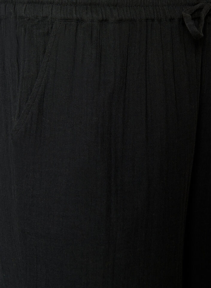 V&auml;lj&auml;sti istuvat puuvillamusliinishortsit korkealla vy&ouml;t&auml;r&ouml;ll&auml;, Musta, Packshot image number 2