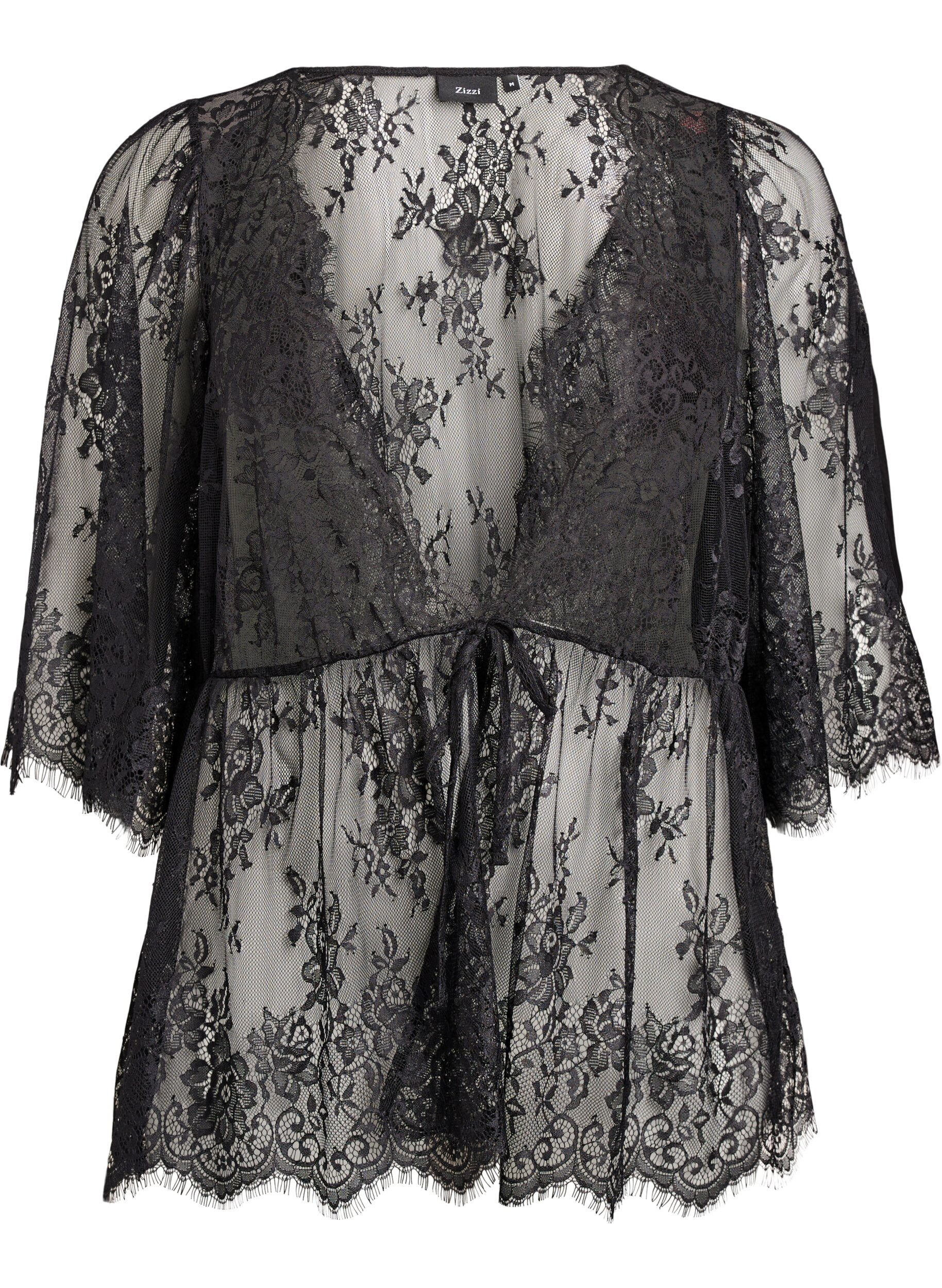 Pitsitoppi solmimisella ja 3/4-hihoilla