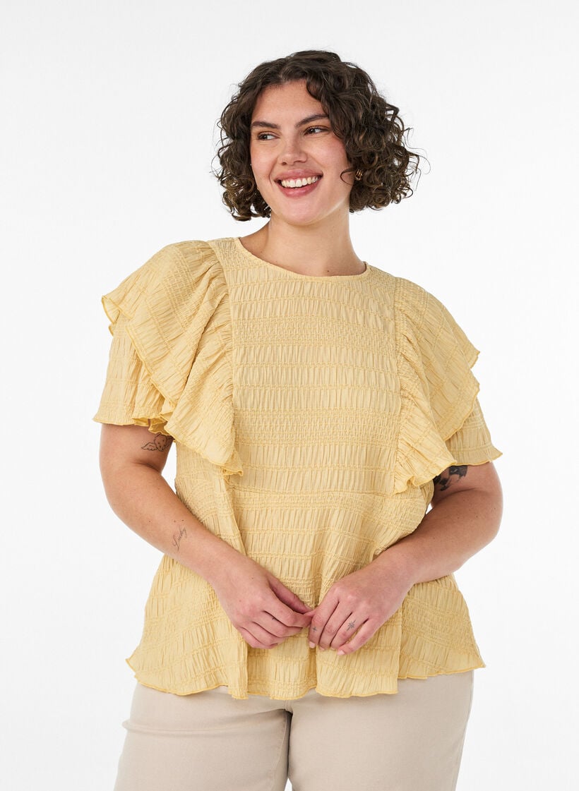 Pusero smock-tekstuurilla ja r&ouml;yhel&ouml;hihoilla, Keltainen, Model image number 0