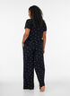 Pyjamahousut ribatulla tekstuurilla ja kukkakuviolla, Musta, Model image number 2