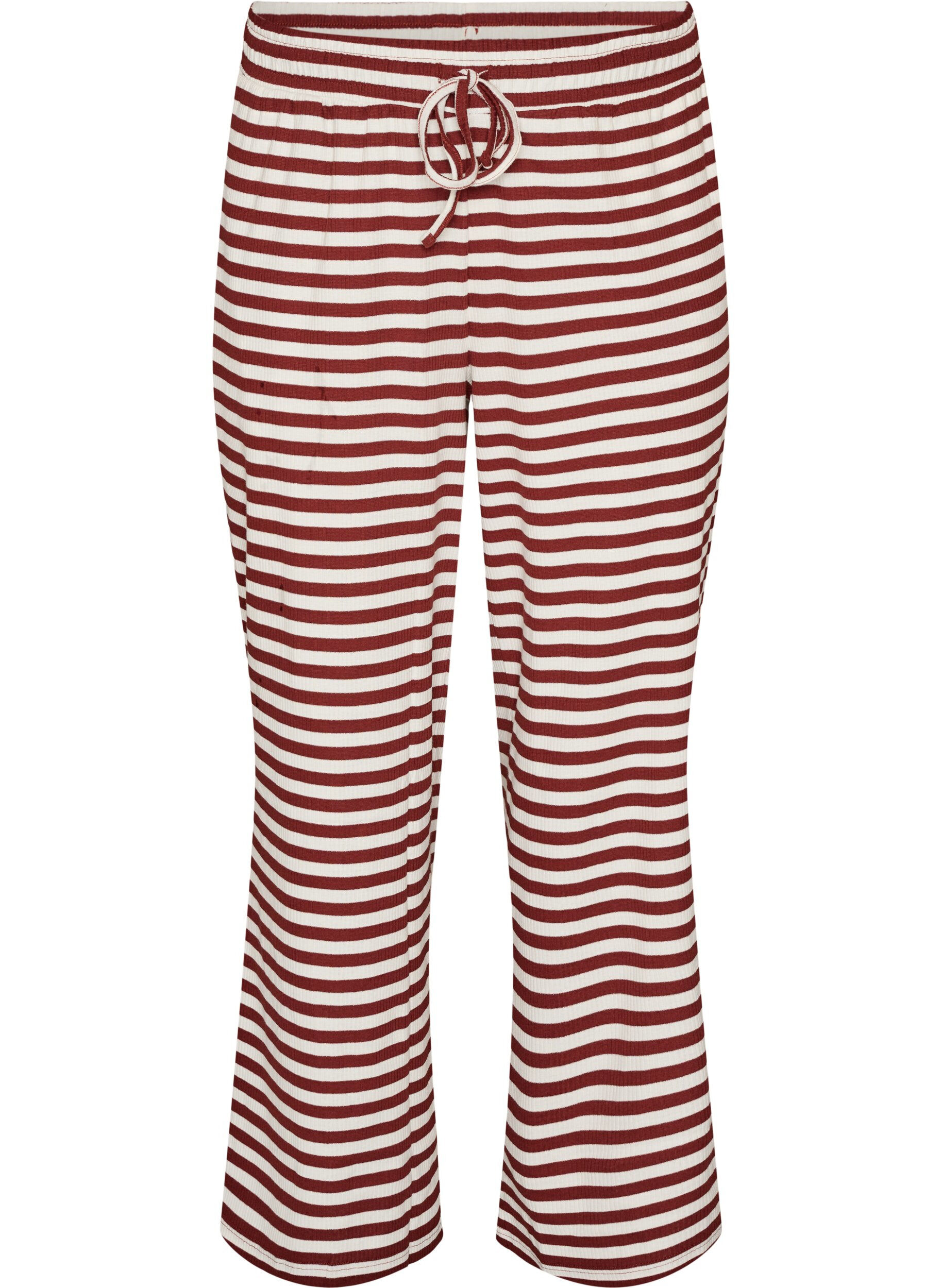 Raidalliset pyjamahousut korkealla vy&ouml;t&auml;r&ouml;ll&auml; ja leveill&auml; lahkeilla