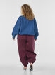 Ilmapallohousut taskuilla ja joustavalla vy&ouml;t&auml;r&ouml;ll&auml;, Punainen, Model image number 1