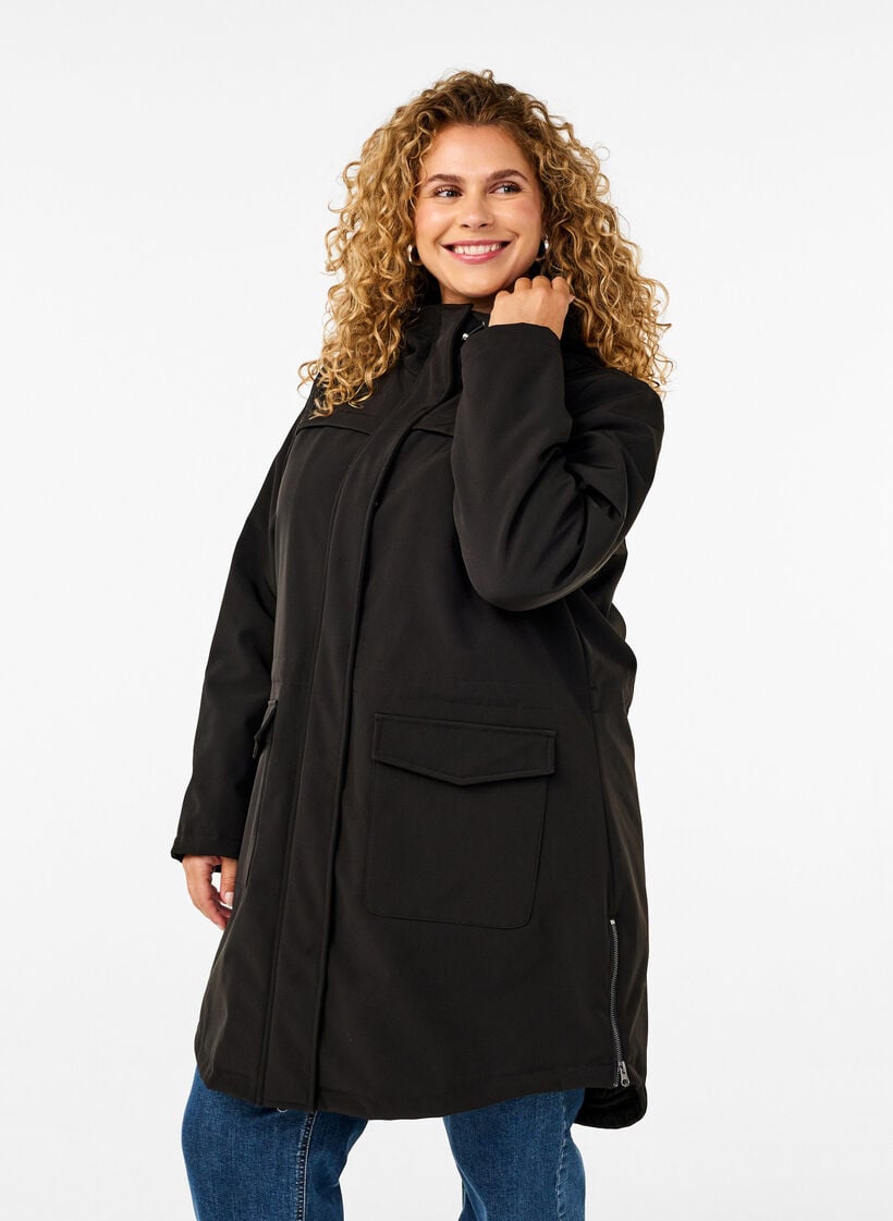 Vett&auml; hylkiv&auml; softshell-takki, jossa on tikattu vuori, Musta, Model image number 0