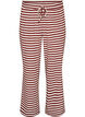 Raidalliset pyjamahousut korkealla vy&ouml;t&auml;r&ouml;ll&auml; ja leveill&auml; lahkeilla, Punainen, Packshot image number 0