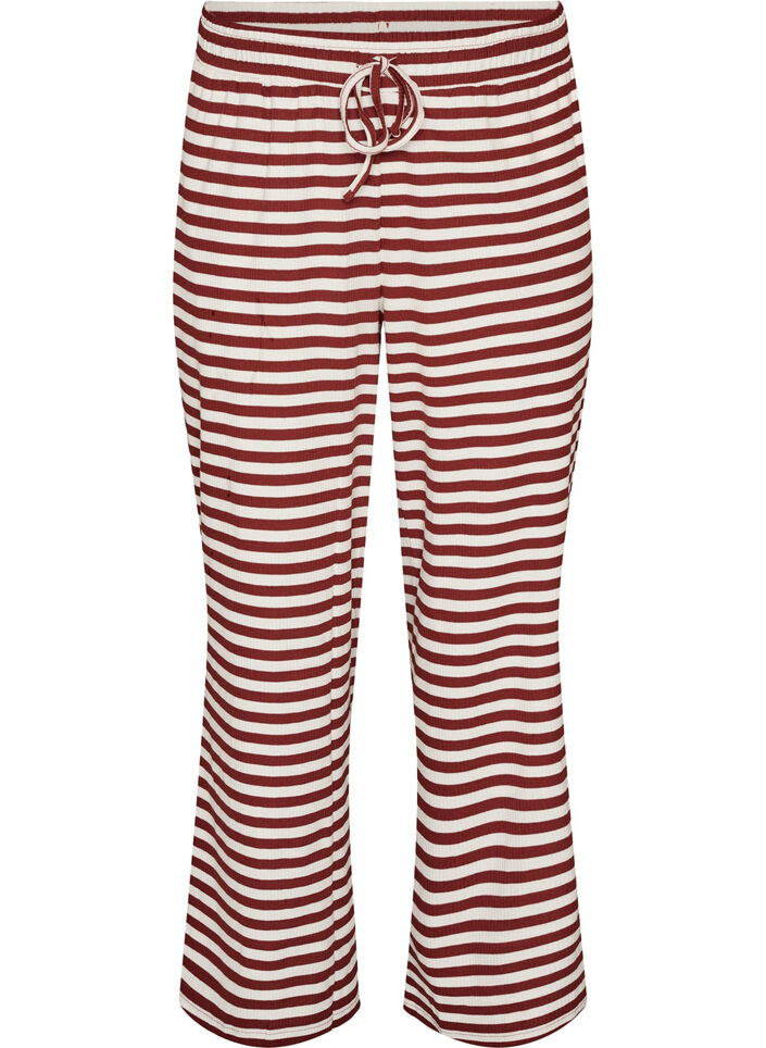 Raidalliset pyjamahousut korkealla vy&ouml;t&auml;r&ouml;ll&auml; ja leveill&auml; lahkeilla, Punainen, Packshot image number 0