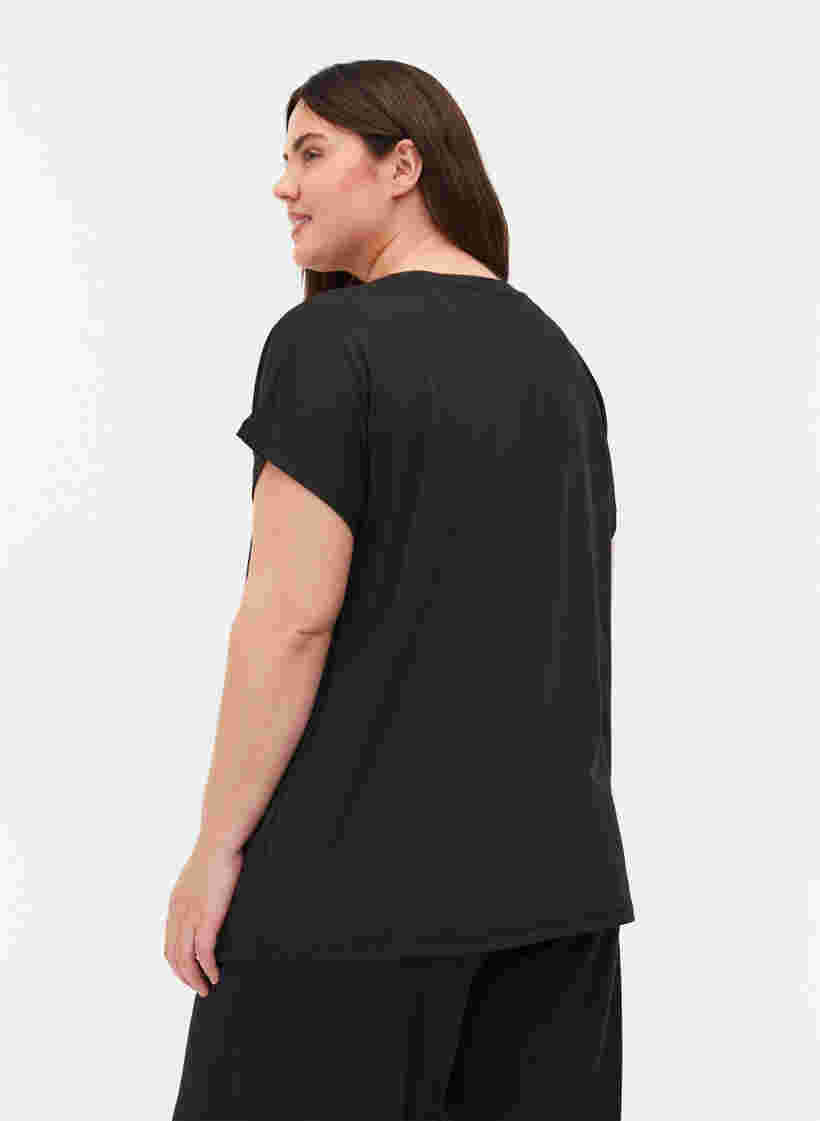 Lyhythihainen treeniin sopiva t-paita v-aukolla , Black, Model image number 1