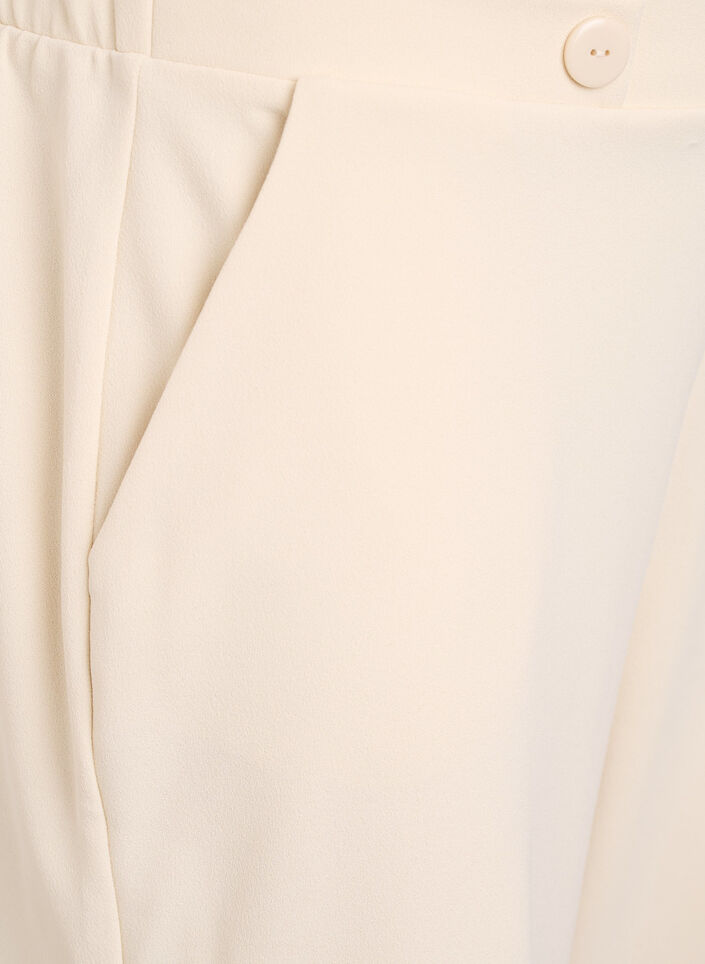 7/8-pituiset housut v&auml;lj&auml;ss&auml; mallissa, Beige, Packshot image number 2
