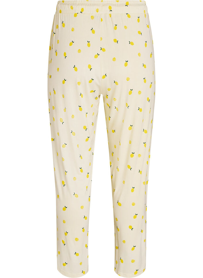 Pyjamahousut pehme&auml;st&auml; jersey-materiaalista, korkea vy&ouml;t&auml;r&ouml; ja hedelm&auml;kuosi, Keltainen, Packshot image number 1