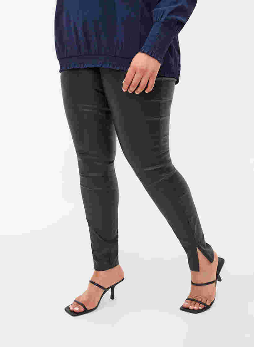 Pinnoitetut leggingsit halkioilla, Black, Model image number 0