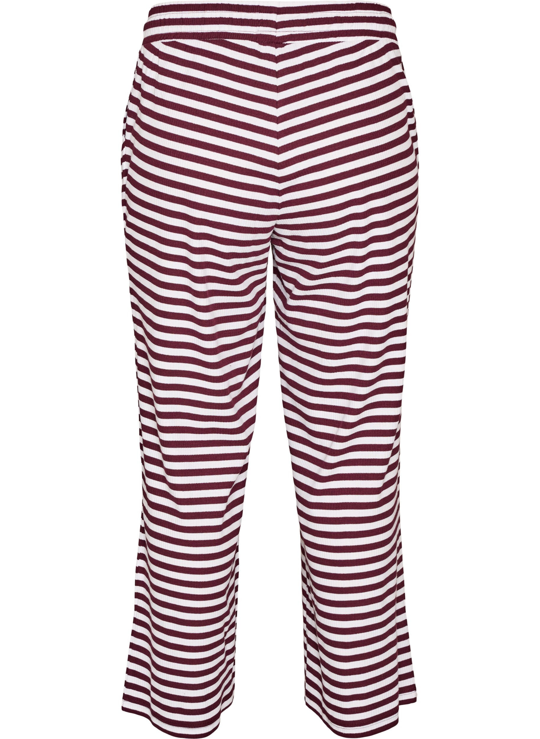 ZizziRaidalliset pyjamahousut korkealla vy&ouml;t&auml;r&ouml;ll&auml; ja leveill&auml; lahkeilla, Punainen, Packshot image number 1