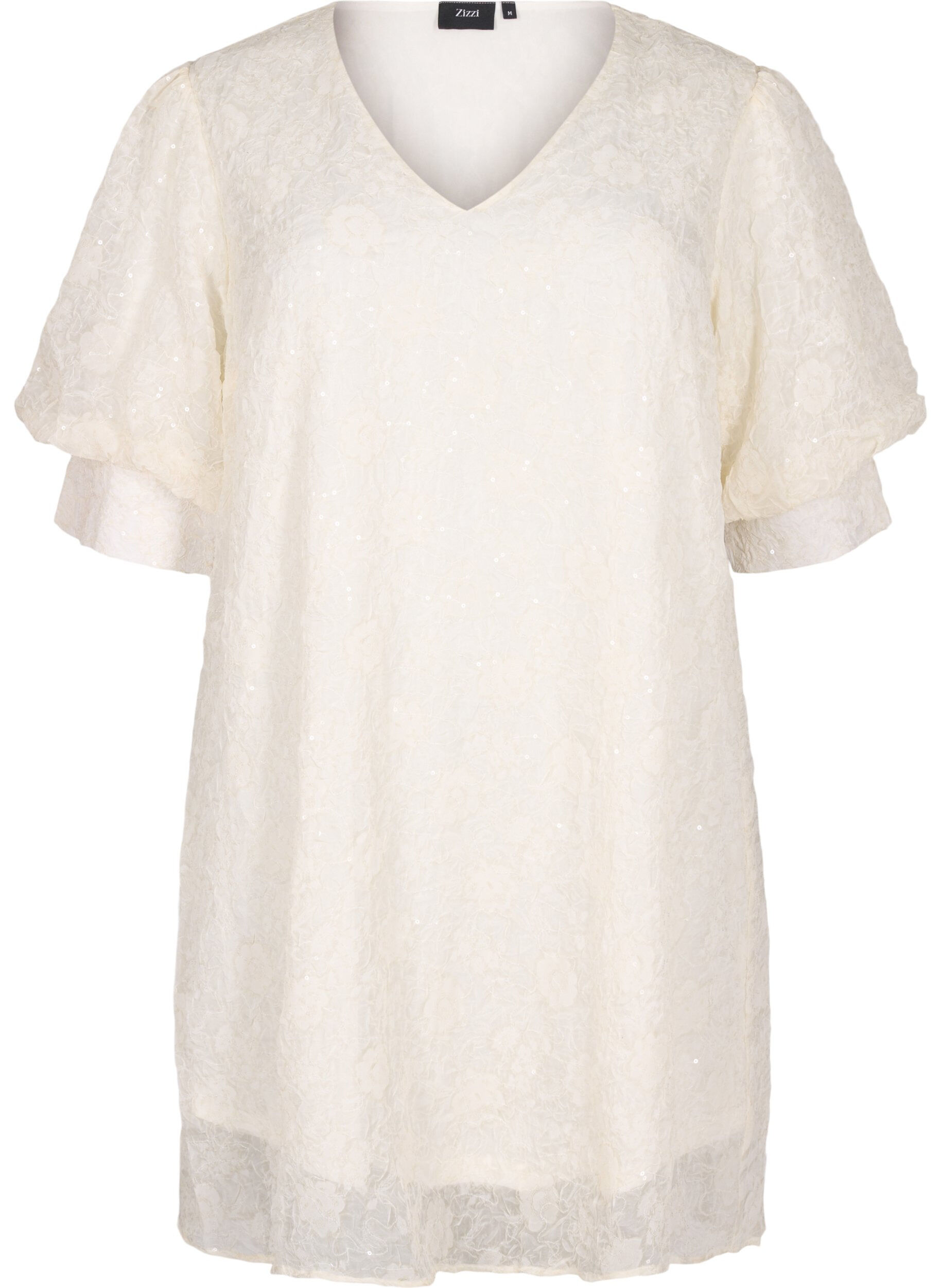 Lyhyt juhlamekko paljeteilla