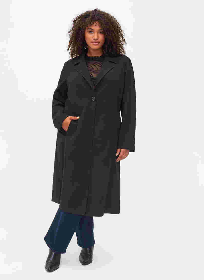 Pitkä takki napituksella, Black, Model