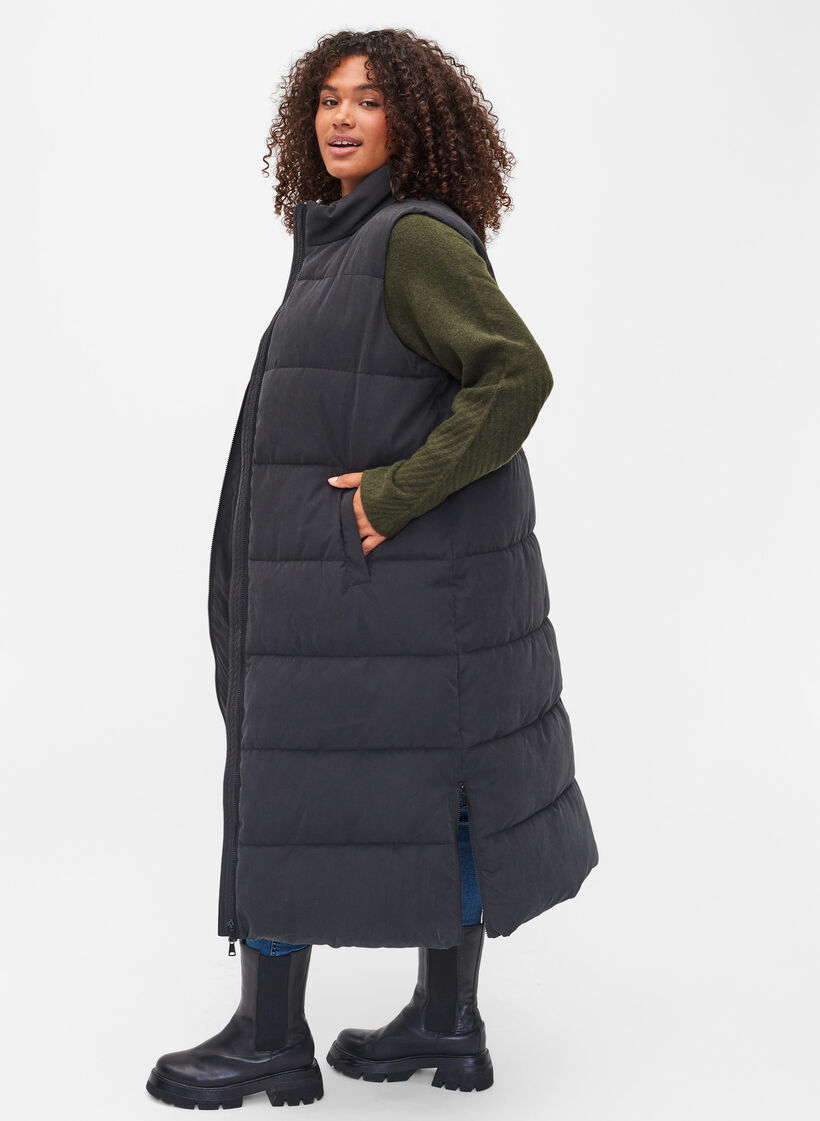 Pitkä liivi korkealla kauluksella ja taskuilla, Black, Model image number 1