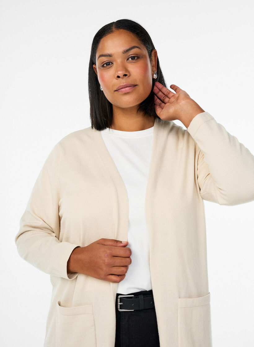 Pitk&auml;, avoin neuletakki taskuilla, Beige, Model image number 2
