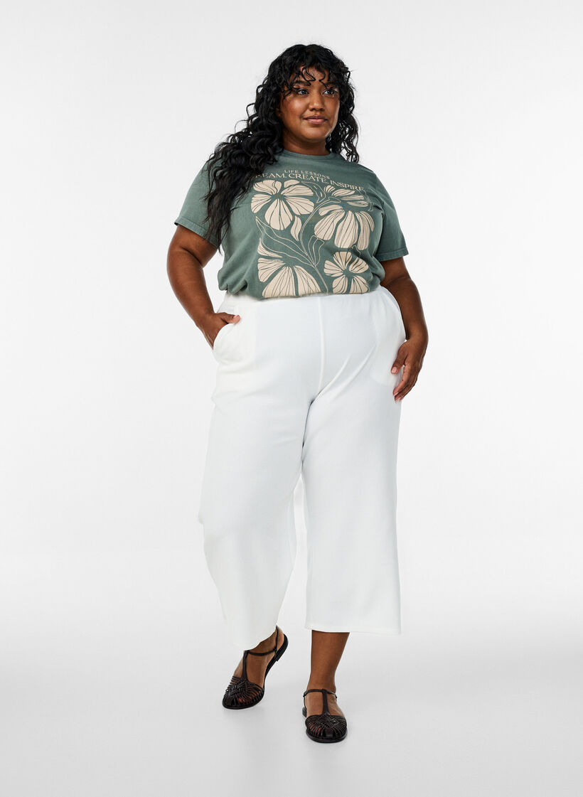 Luomupuuvillasta valmistettu T-paita teksti- ja kukkapainatuksella, Vihreä, Model image number 1