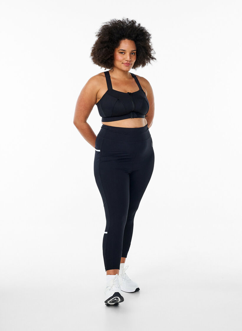 Juoksutrikoot kevyellä kompressiolla ja sivutaskuilla, Musta, Model image number 1