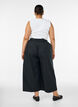 Culotte -housut joustavalla vy&ouml;t&auml;r&ouml;ll&auml; ja leveill&auml; lahkeilla, Musta, Model image number 1