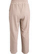 Raidalliset pyjamahousut korkealla vy&ouml;t&auml;r&ouml;ll&auml; ja leveill&auml; lahkeilla, Beige, Packshot image number 1