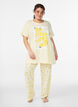 Pyjamahousut pehme&auml;st&auml; jersey-materiaalista, korkea vy&ouml;t&auml;r&ouml; ja hedelm&auml;kuosi, Keltainen, Model image number 0