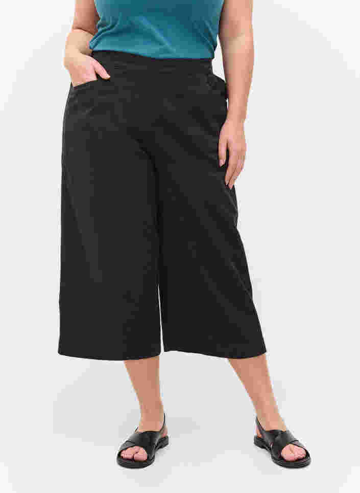 Väljät culottes-housut puuvillasta , Black, Model image number 1