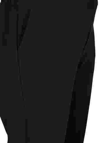 Leveät housut taskuilla , Black, Packshot image number 2