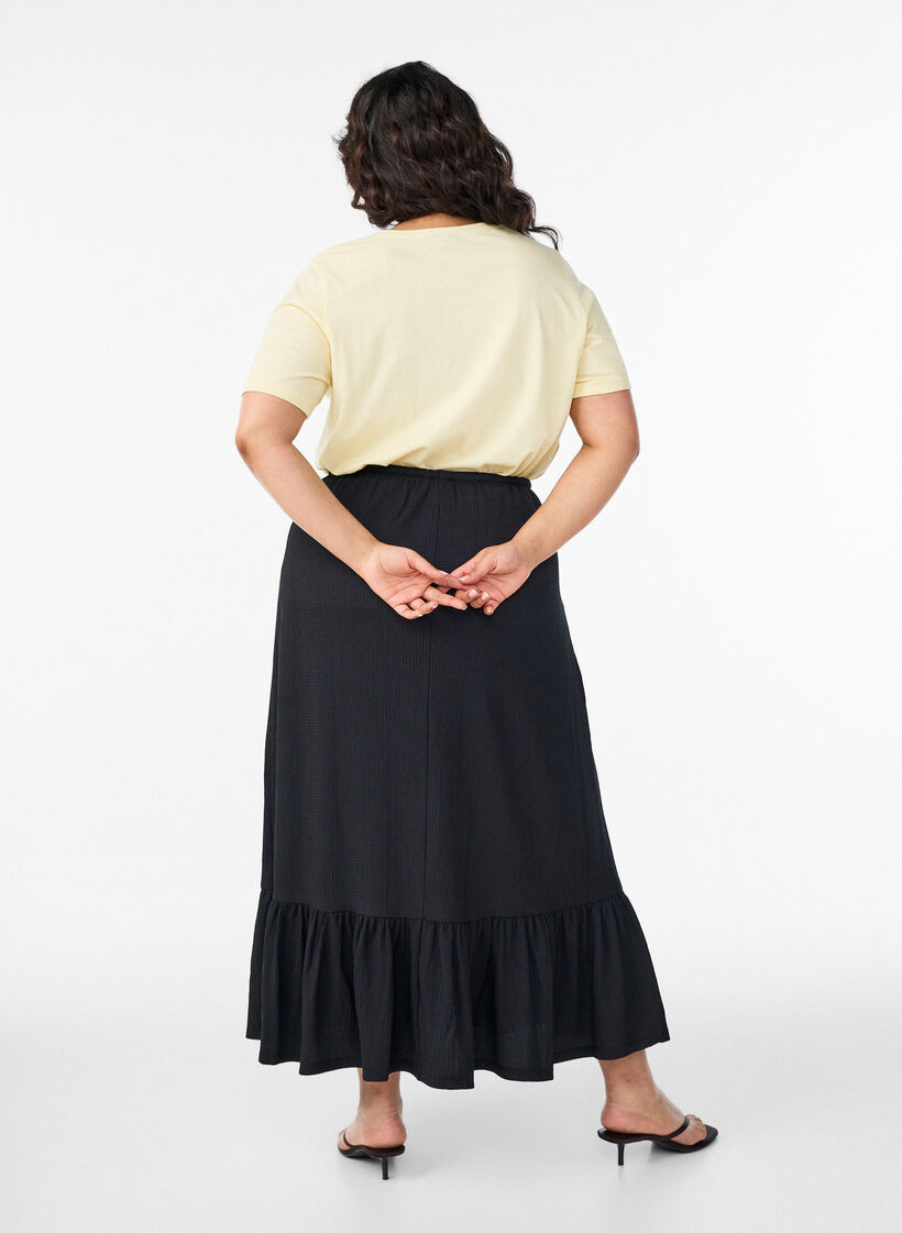 Pitk&auml; hame solmittavalla vy&ouml;ll&auml; ja r&ouml;yhel&ouml;helmalla, Musta, Model image number 1