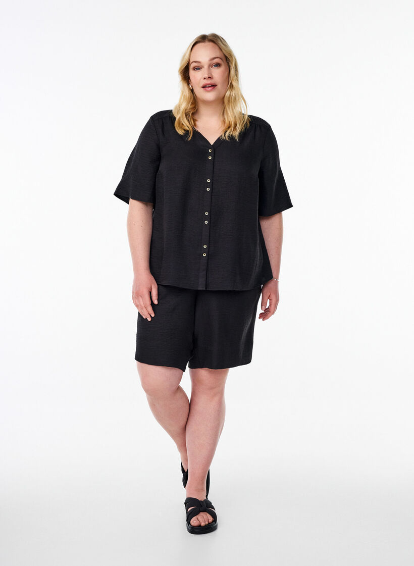 Lyhythihainen paitapusero v-p&auml;&auml;ntiell&auml;, Musta, Model image number 1