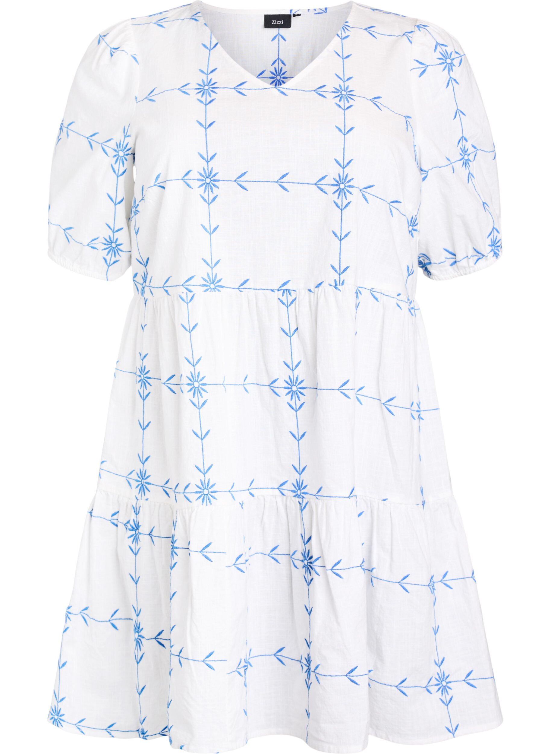 Lyhyt kirjailtu mekko, jossa on V-p&auml;&auml;ntie