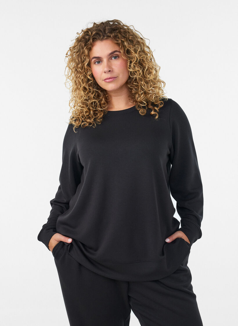 Pitk&auml;hihainen jerseypusero py&ouml;re&auml;ll&auml; p&auml;&auml;ntiell&auml;, Musta, Model image number 0