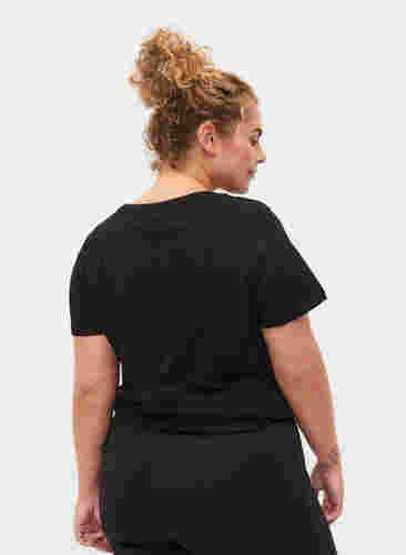 T-paita printillä treeniin , Black w. stripe run, Model image number 1