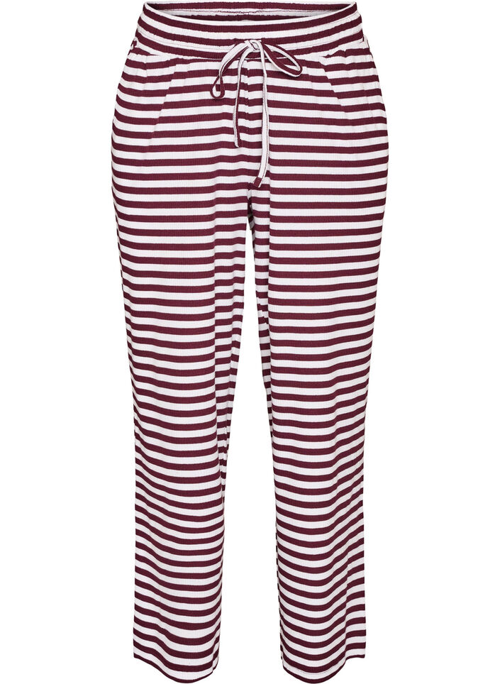 Raidalliset pyjamahousut korkealla vy&ouml;t&auml;r&ouml;ll&auml; ja leveill&auml; lahkeilla, Punainen, Packshot image number 0