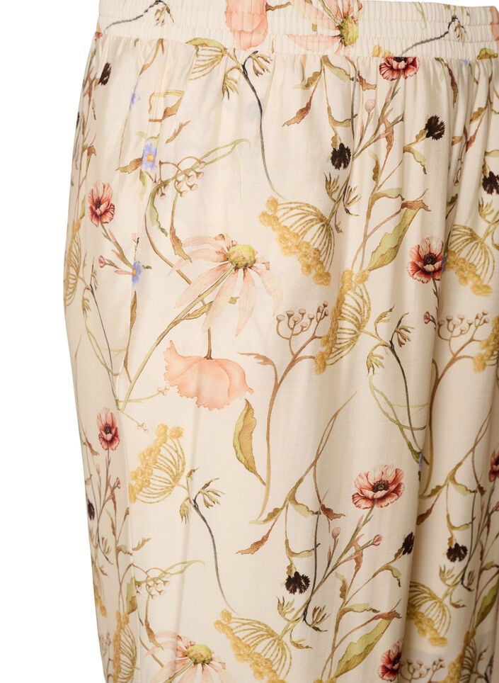 Korkeavy&ouml;t&auml;r&ouml;iset viskoosihousut kukkakuosilla, Beige, Packshot