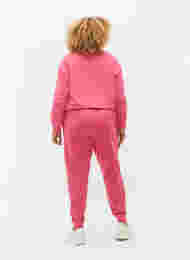 Collegehousut printillä ja taskuilla , Hot Pink AOP, Model